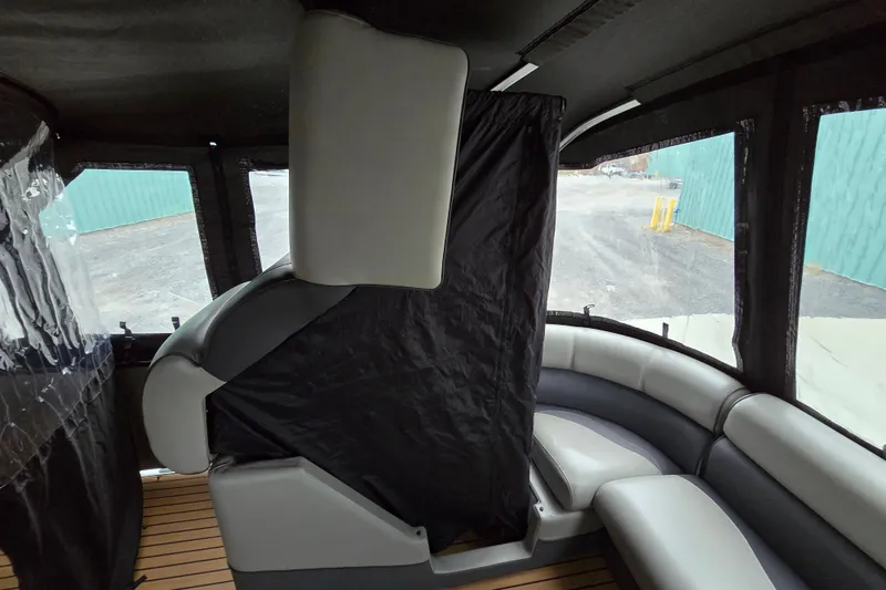 Slide: The Image of Interior of 2015 Premier 230 SunSation RF pontoon boat with seating and cover. - 45