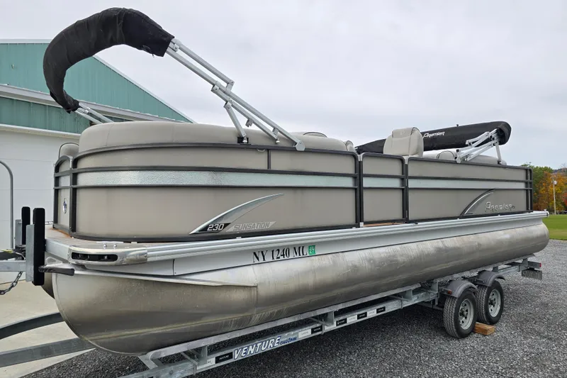 Slide: The Image of 2015 Premier 230 SunSation RF pontoon boat on trailer, side view. - 5