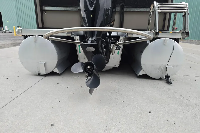Slide: The Image of Rear view of 2015 Premier 230 SunSation RF pontoon boat with visible propeller. - 52