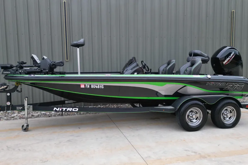 Slide: The Image of 2019 Nitro Z18 Pro fishing boat with Mercury engine on trailer. - 2