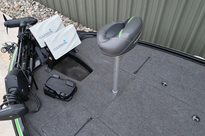 Slide: The Image of 2019 Nitro Z18 Pro boat deck with Garmin electronics and cushioned seat. - 8