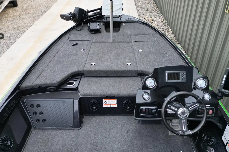 Slide: The Image of 2019 Nitro Z18 Pro boat interior with steering wheel and control panel. - 9
