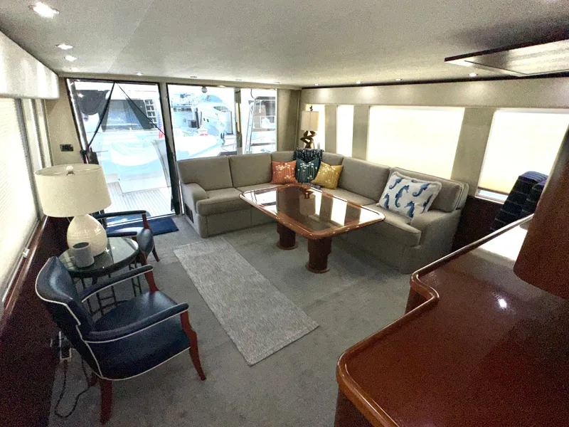 Slide: The Image of Luxurious interior of 2003 Pacific Mariner 65 SE Motoryacht with elegant seating and decor. - 11
