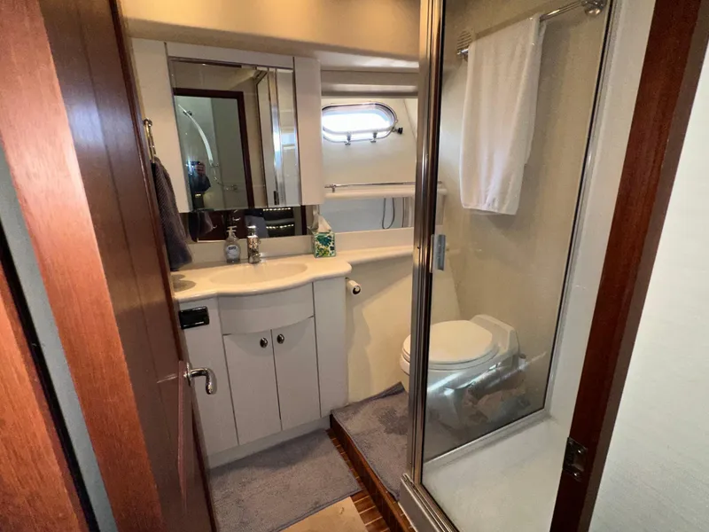 Slide: The Image of Bathroom interior of 2003 Pacific Mariner 65 SE Motoryacht with shower and vanity. - 28