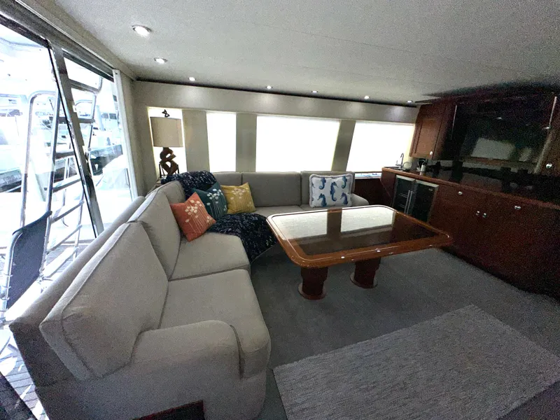 Slide: The Image of Luxurious interior of 2003 Pacific Mariner 65 SE Motoryacht with elegant seating and table. - 3