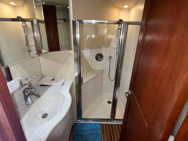Slide: The Image of Bathroom interior of 2003 Pacific Mariner 65 SE Motoryacht with shower and sink. - 33