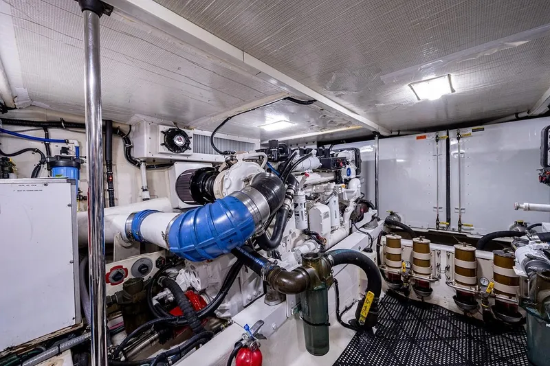 Slide: The Image of Engine room of 2003 Pacific Mariner 65 SE Motoryacht, featuring mechanical components and equipment. - 45