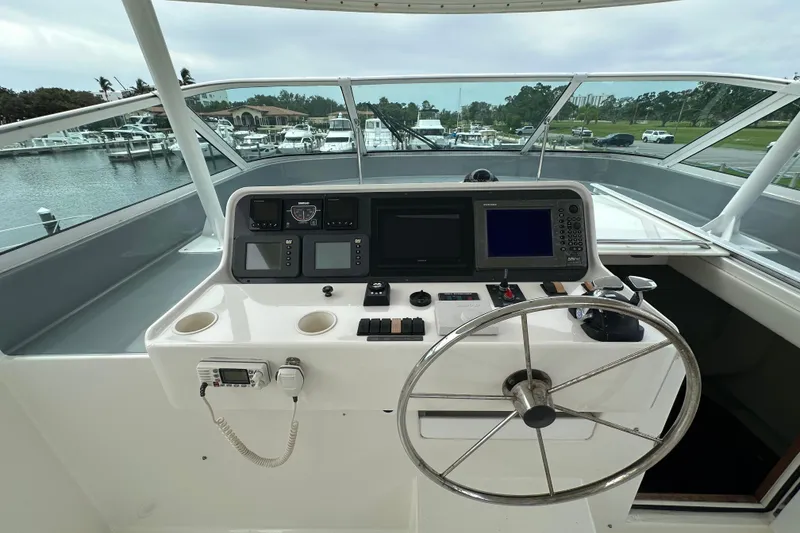 Slide: The Image of Helm of 2003 Pacific Mariner 65 SE Motoryacht with navigation equipment and steering wheel. - 59
