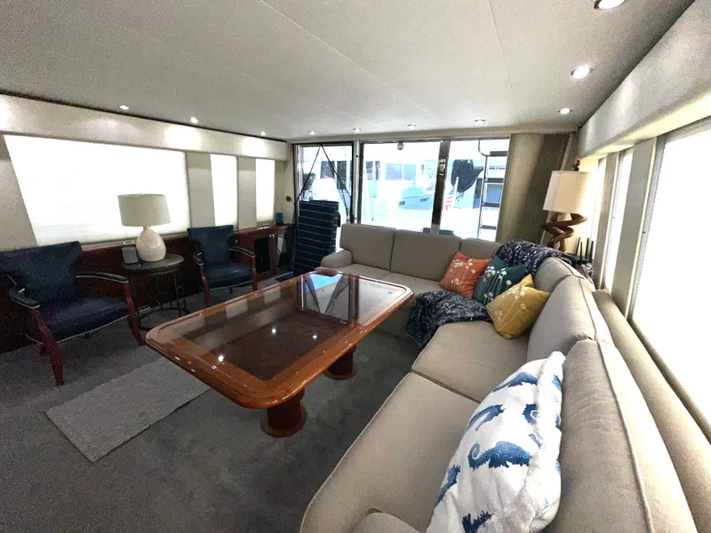 Slide: The Image of Luxurious interior of a 2003 Pacific Mariner 65 SE Motoryacht with elegant seating and decor. - 6