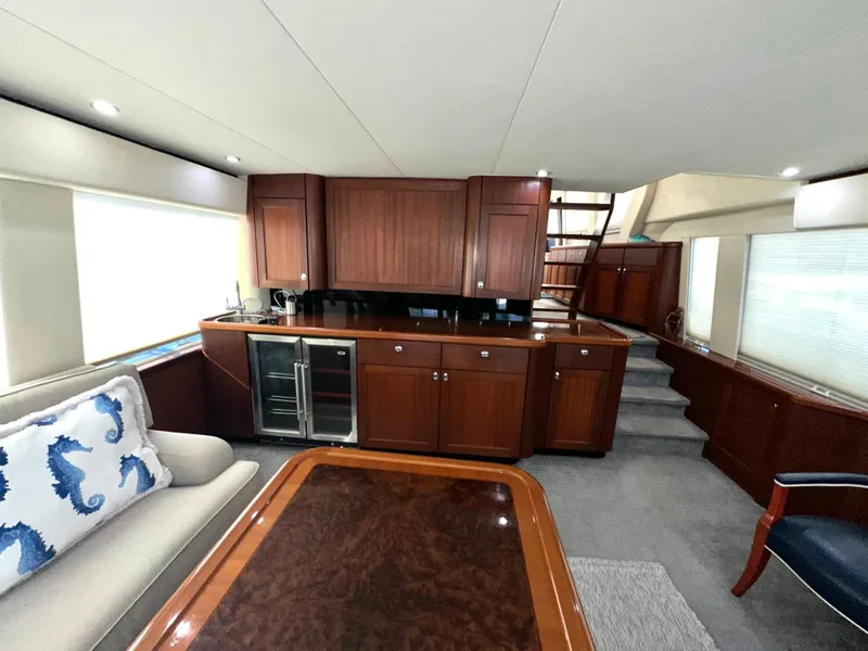 Slide: The Image of Luxurious interior of 2003 Pacific Mariner 65 SE Motoryacht with elegant wood cabinetry. - 8