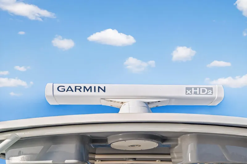 Slide: The Image of Garmin xHD2 radar on 2017 World Cat 295 DC boat under blue sky. - 29