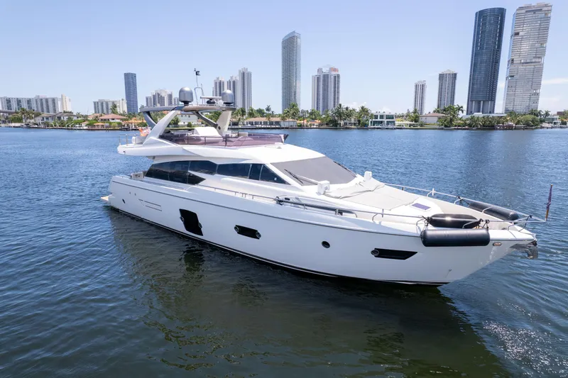 Slide: The Image of Luxurious 2015 Ferretti Yachts 750 cruising near a city skyline. - 1