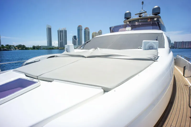 Slide: The Image of Luxurious 2015 Ferretti Yachts 750 with city skyline backdrop and sleek deck design. - 10