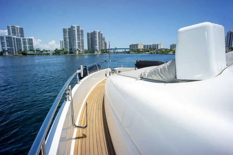 Slide: The Image of Luxurious 2015 Ferretti Yachts 750 cruising near modern city skyline. - 11