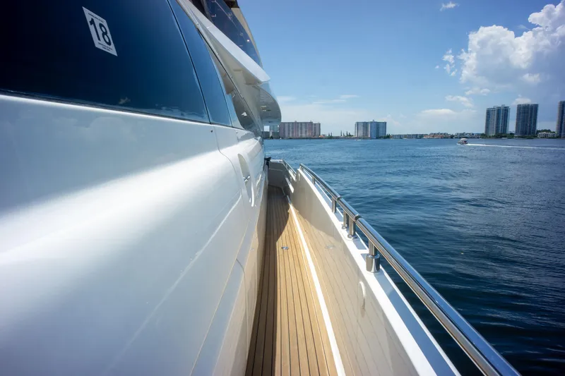 Slide: The Image of 2015 Ferretti Yachts 750 cruising on a sunny day, showcasing sleek design and ocean view. - 13