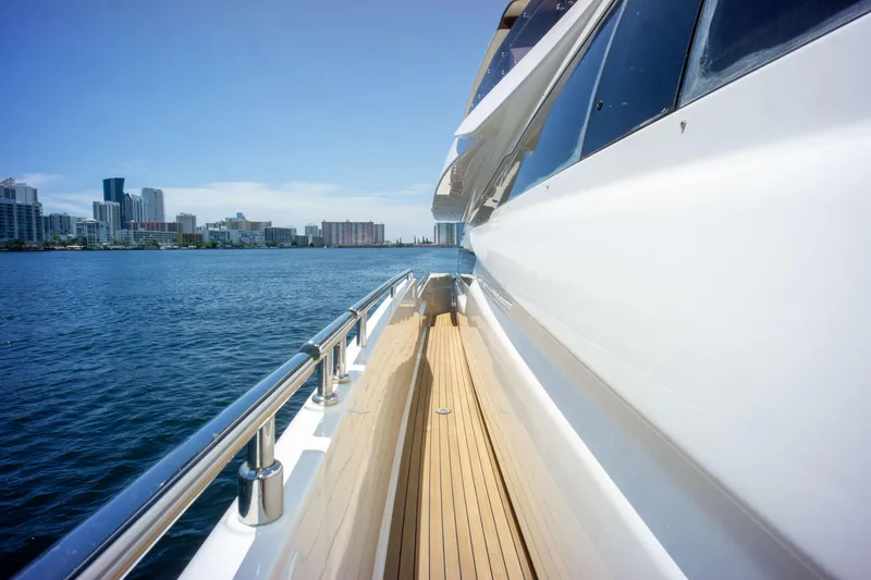 Slide: The Image of Side view of 2015 Ferretti Yachts 750 on water with city skyline. - 14