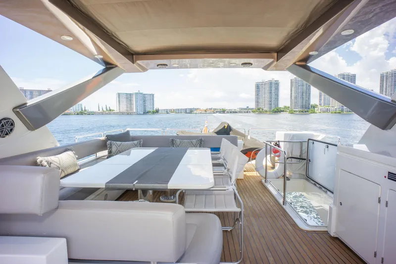 Slide: The Image of Luxurious 2015 Ferretti Yachts 750 with spacious deck and waterfront city view. - 17