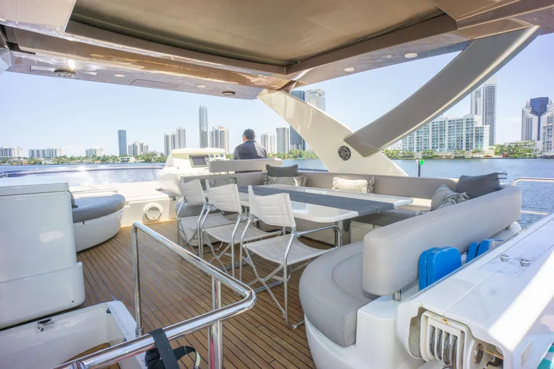 Slide: The Image of Luxurious 2015 Ferretti Yachts 750 with spacious deck, city skyline view. - 19