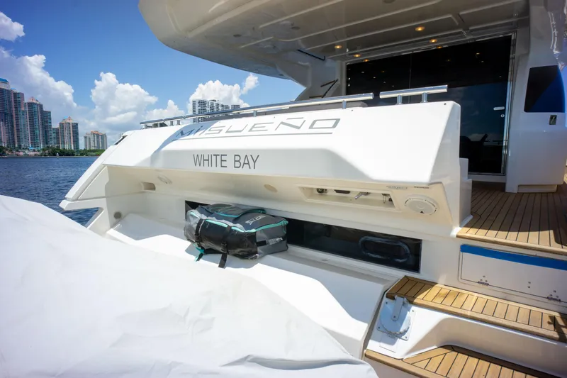 Slide: The Image of Ferretti Yachts 750, 2015 model, docked with city skyline in background. - 25