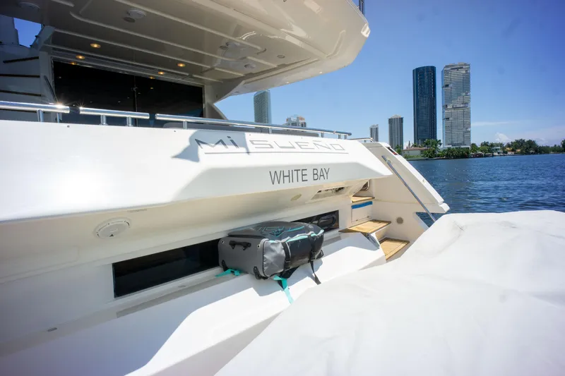 Slide: The Image of Luxury Ferretti Yachts 750, 2015 model, docked with city skyline in background. - 26