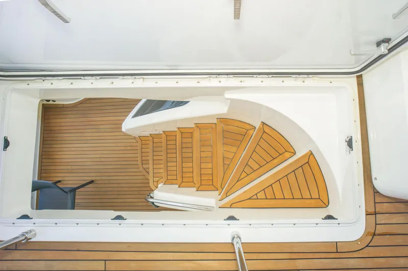 Slide: The Image of Staircase on 2015 Ferretti Yachts 750 with elegant wooden design and sleek finish. - 28