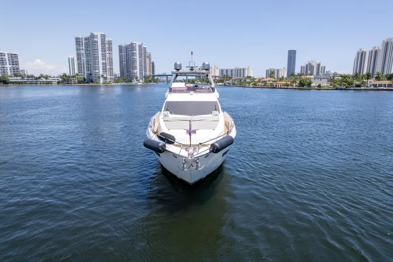 Slide: The Image of 2015 Ferretti Yachts 750 on water with city skyline in background. - 3