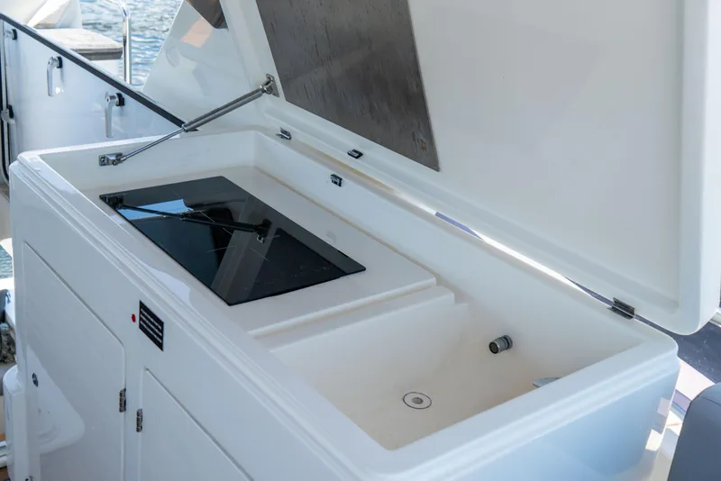 Slide: The Image of Outdoor kitchenette on 2015 Ferretti Yachts 750, featuring a sleek design and modern amenities. - 31