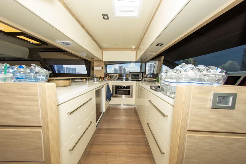 Slide: The Image of Luxurious kitchen interior of 2015 Ferretti Yachts 750 with modern appliances and ample storage. - 33