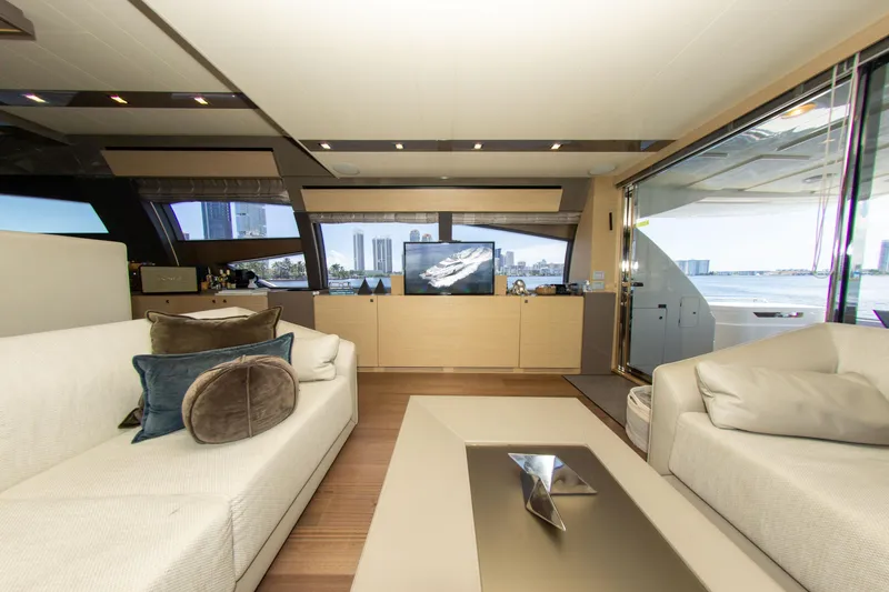 Slide: The Image of Luxurious interior of 2015 Ferretti Yachts 750 with modern furnishings and cityscape view. - 39