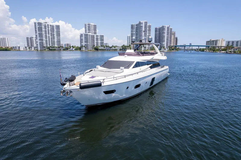 Slide: The Image of 2015 Ferretti Yachts 750 cruising in a city waterfront with skyscrapers. - 4