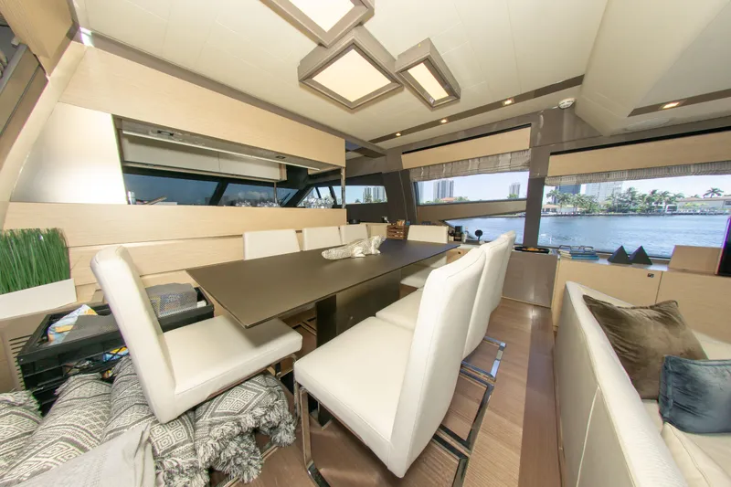 Slide: The Image of Luxurious interior of 2015 Ferretti Yachts 750 with elegant dining area and waterfront view. - 43