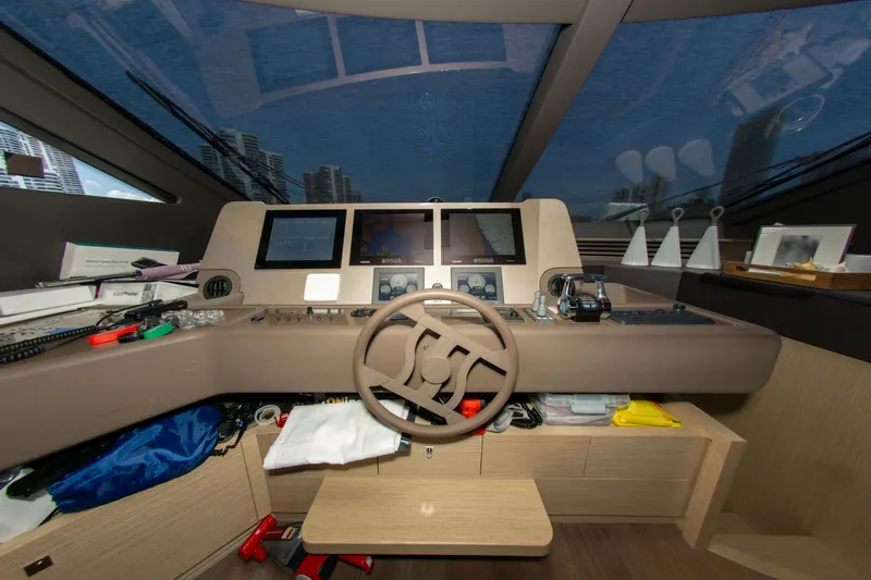 Slide: The Image of Helm of 2015 Ferretti Yachts 750 with modern navigation equipment and panoramic view. - 46