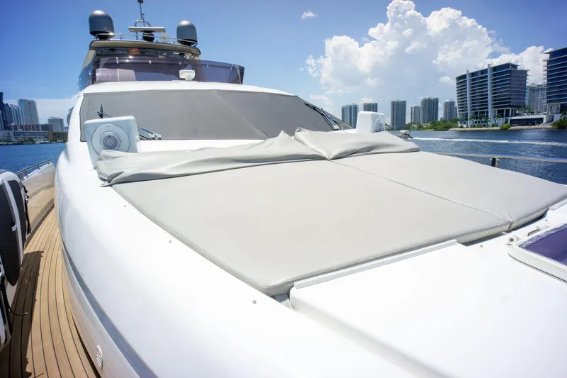 Slide: The Image of Luxurious 2015 Ferretti Yachts 750 with spacious sun deck, city skyline in background. - 9