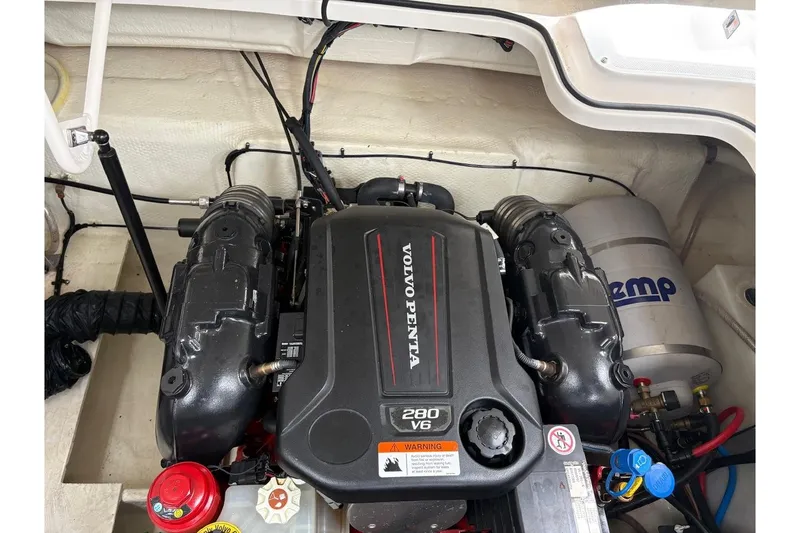 Slide: The Image of Volvo Penta engine in 2021 Regal 26 Express boat, showcasing powerful V6 design. - 15