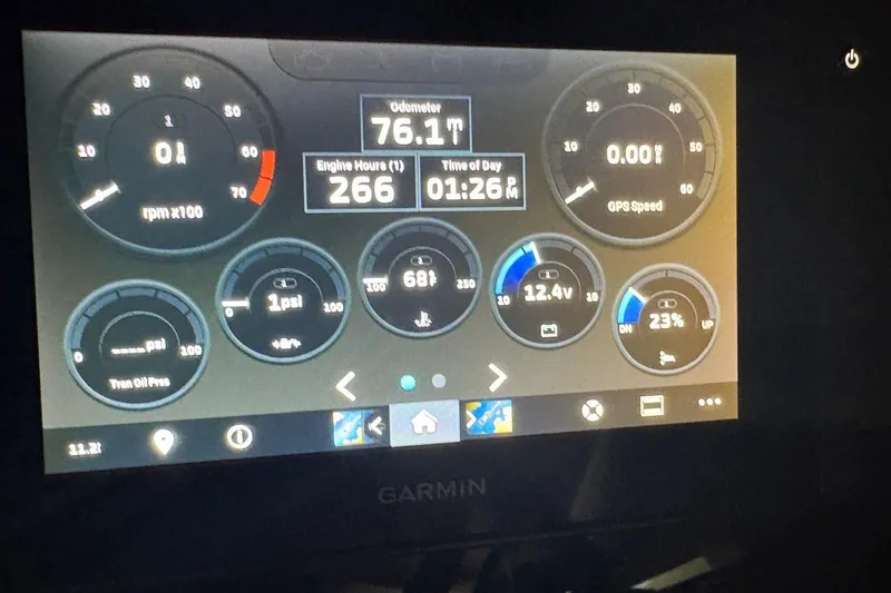 Slide: The Image of Dashboard display of a 2021 Regal 26 Express boat with various gauges and metrics. - 24