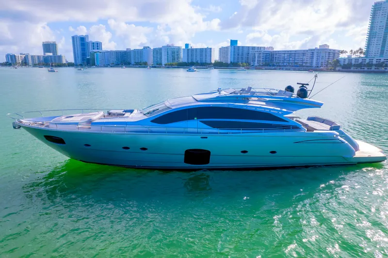 Slide: The Image of Luxurious 2013 Pershing 82 yacht cruising in sunny coastal waters. - 14