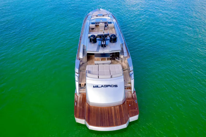 Slide: The Image of Luxurious 2013 Pershing 82 yacht on vibrant green water, aerial view. - 22