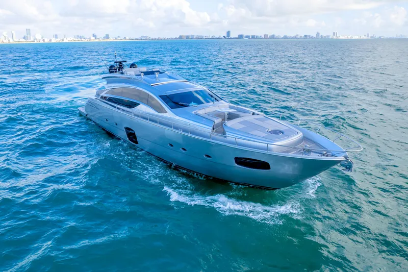 Slide: The Image of Luxurious 2013 Pershing 82 yacht cruising on open sea under clear skies. - 3