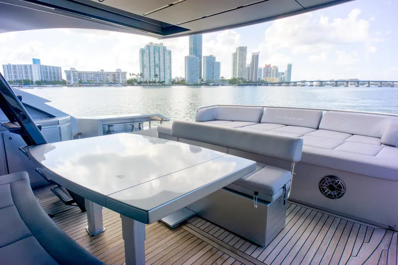 Slide: The Image of Luxurious 2013 Pershing 82 yacht deck with city skyline view. - 33