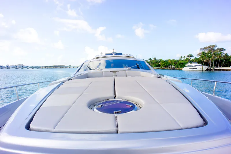 Slide: The Image of Luxury Pershing 82 yacht deck view, 2013 model, on serene blue waters. - 39