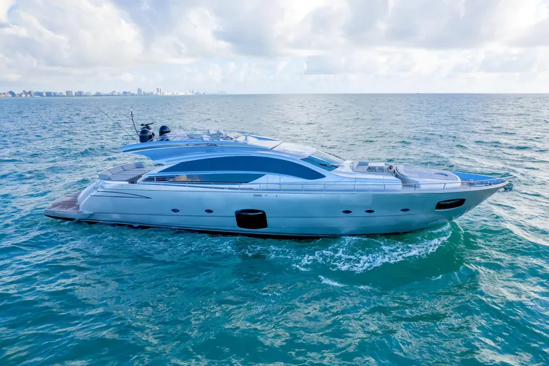 Slide: The Image of Luxurious 2013 Pershing 82 yacht cruising on open sea under cloudy sky. - 4