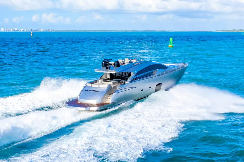 Slide: The Image of Luxury Pershing 82 yacht cruising on open sea, 2013 model, creating dynamic waves. - 5