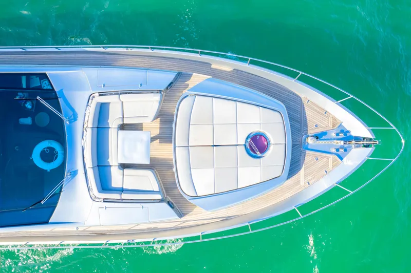 Slide: The Image of Aerial view of 2013 Pershing 82 yacht on turquoise water. - 7