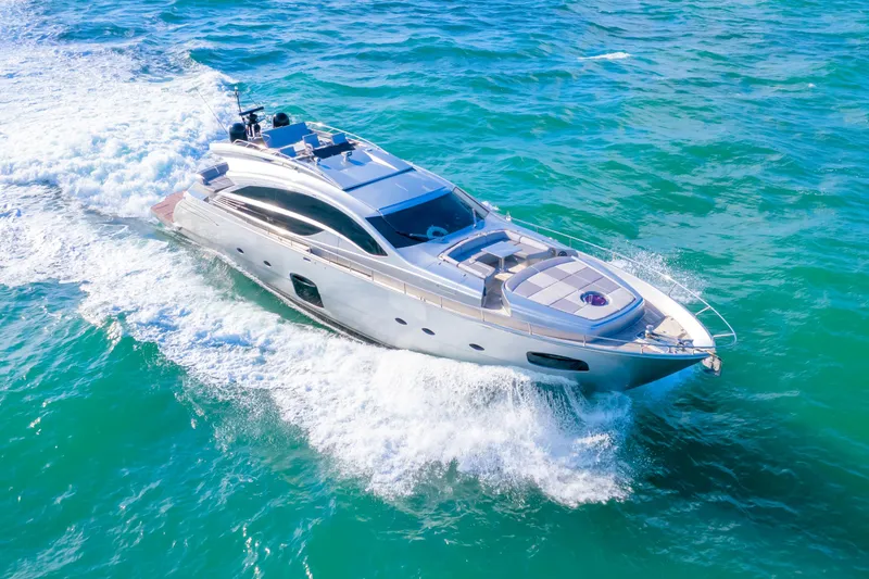 Slide: The Image of Luxury 2013 Pershing 82 yacht cruising on turquoise waters. - 8