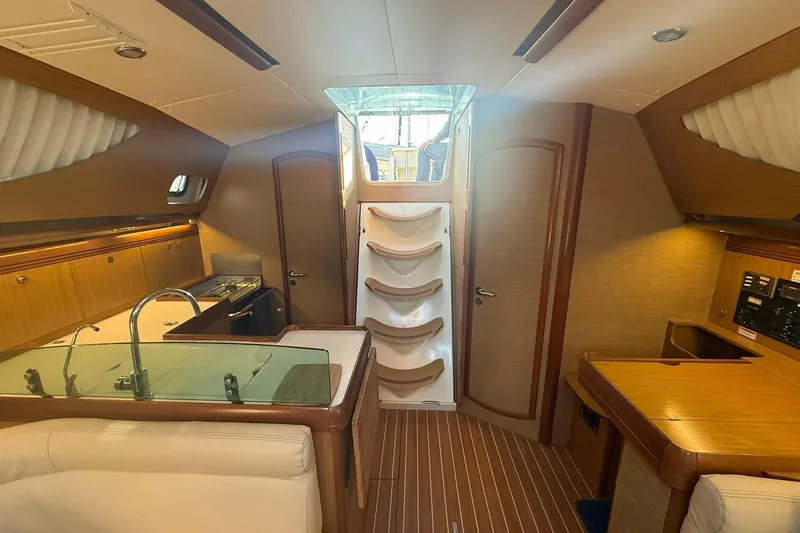 Slide: The Image of 2008 Jeanneau Sun Odyssey 42 DS sailboat docked on a sunny day. - 17