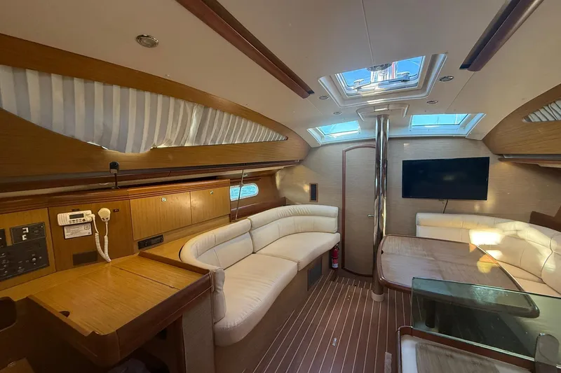 Slide: The Image of 2008 Jeanneau Sun Odyssey 42 DS sailboat docked on a sunny day. - 18