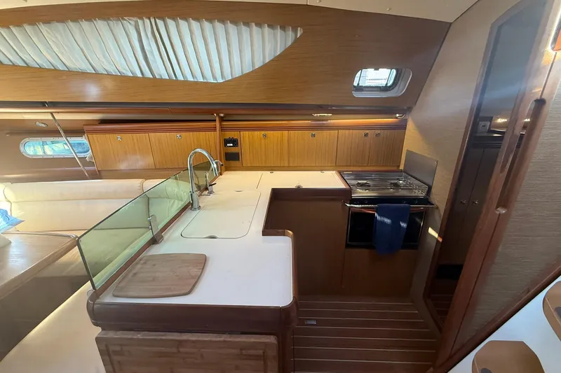 Slide: The Image of Luxurious interior of 2008 Jeanneau Sun Odyssey 42 DS yacht with elegant seating and modern amenities. - 23