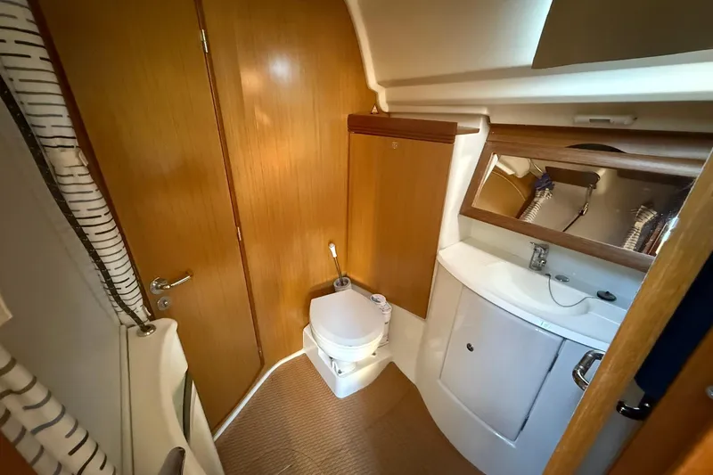 Slide: The Image of Luxurious interior of 2008 Jeanneau Sun Odyssey 42 DS yacht with plush seating and modern design. - 24