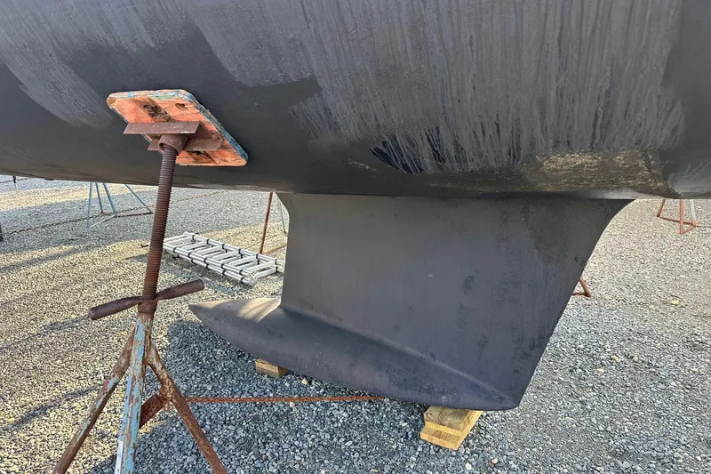 Slide: The Image of 2008 Jeanneau Sun Odyssey 42 DS sailboat on a lift, ready for maintenance. - 41