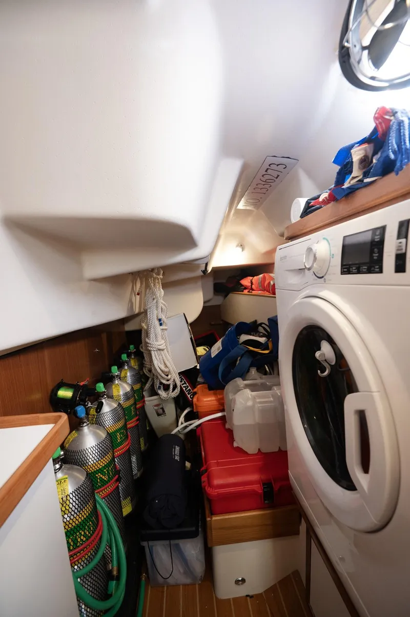Slide: The Image of Laundry area with scuba gear in 2024 Catalina 445 sailboat. - 19